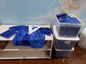 lot 1183 image: 3 Totes FULL of Kindergarden Graduation Caps, Gowns & Sashes.  50 Sets