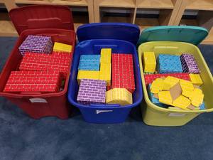 lot 1207 image: 3 Large Totes Full of Cardboard Building Blocks.  How good is your fort game