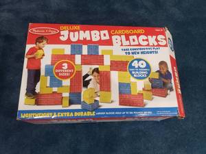 lot 1208 image: Melisa & Doug Deluxe Jumbo Cardboard Building Blocks.