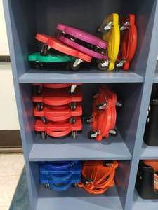 lot 1220 image: Large Quantity of Sit & Scoot Rolling Carts