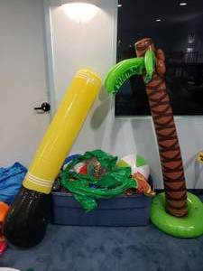 lot 1227 image: Large Assortment of Inflatables.  Beach Balls, Island Theme, Desert Them & More