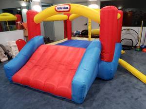 lot 1250 image: Little Tikes Inflatable Bouncehouse w Blower, Bag & Stakes