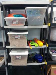 lot 1276 image: Contents of Shelf.  Summertime goodies and everything needed for the ultimate luau.  SHELF NOT INCLUDED.