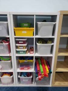 lot 1283 image: Large Lot of Misc Kids Instruments.  Pineapple Shakers, Boom Whackers, Bells, Percussion Instruments, Trumpets & More.  SHELF NOT INCLUDED.