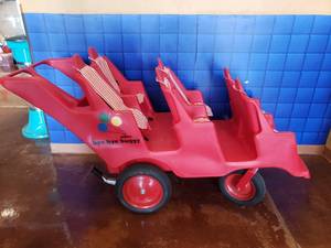 lot 1353 image: Angeles Bye Bye Buggy 6 Kid Stroller w Brakes