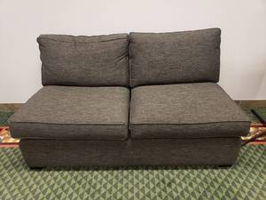 lot 1473 image: Grey Armless Loveseat