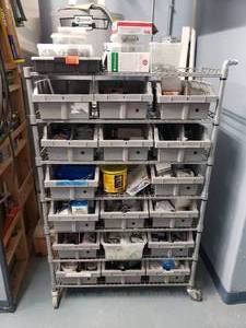 lot 1540 image: Rolling Metal Wire Shelf FULL of Contents.  ALL CONTENTS INCLUDED