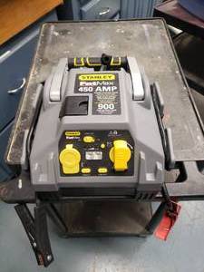 lot 1551 image: Stanley Fat Max 450 Amp Jump Starter w Charger & Compressor