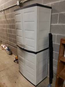 lot 1579 image: Plastic Garage Cabinet w Contents