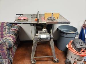 lot 1411 image: Craftsman Model 113.298031 10 Table Saw w Rolling Base & Extra Blades