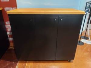 lot 1608 image: Large Rolling Storage Cabinet w Butcher Block Top.  Measures 49 x 43 x 25.5