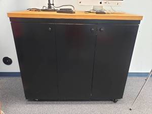 lot 1629 image: Large Rolling Storage Cabinet w Butcher Block Top.  Measures 49 x 43 x 25.5