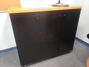 lot 1630 image: Large Rolling Storage Cabinet w Butcher Block Top.  Measures 49 x 43 x 25.5