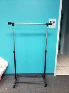 lot 1631 image: Rolling Clothes Rack