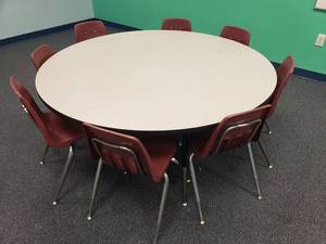 lot 1778 image: Round 60 Adjustable Height Clasroom Table.  60 Wide w 8 Chairs