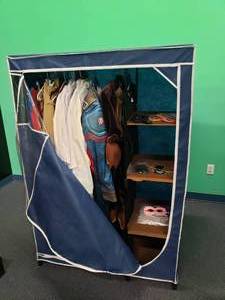 lot 1830 image: 36 Home Clothing Storage Closet Full of Costumes