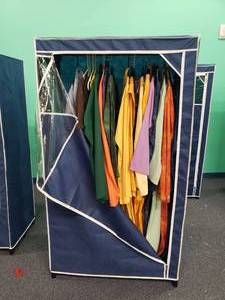 lot 1829 image: 36 Home Clothing Storage Closet Full of Costumes