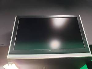 lot 1840 image: Westinghouse Wall Mounted TV.  Buyer to remove.