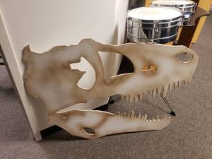lot 1933 image: Large Wooden Dinosaur Skull Cutout