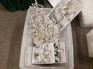lot 1944 image: Tote Full of Misc Christmas Dcor.  Tree Toppers & Table Dcor
