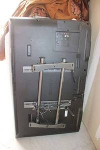 lot 12 image: Sony Bravia LCD Digital Color TV Model KDL-46BX420 (has hanging bracket attached)
