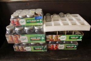 lot 81 image: Mason Jars mostly unopened. Different sizes as shown.