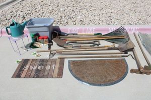 lot 50 image: Welcome mats, Yard tools, garden seeds and more