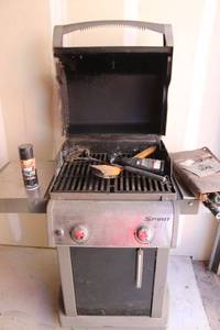 lot 83 image: Weber Spirit Propane Grill with grilling tools