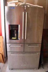 lot 78 image: Kitchen Aid Refrigerator with water filter replacement filter (Frig needs cleaned)