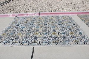 lot 45 image: Safavieh Area Rug WhiteSilver with blue, gray and yellow accents - 8x10