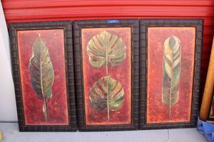 lot 71 image: Set of 3 Palm leaf Wall Art. Approx. 20x3 each