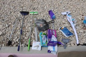lot 56 image: Cleaning mopsSwiffers, Steam mop, Bear Spray, broom and grabber stick