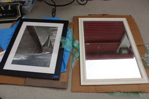 lot 90 image: Framed sailboat print and  framed mirror