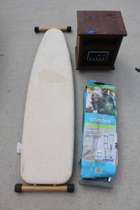 lot 91 image: Ironing board with wood stand, Crutches and Portable personal heater