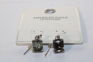 lot 107 image: Signed American Eagle Outfitters crystal dangle French ear wire earrings on card.