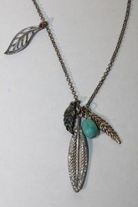 lot 109 image: Signed American Eagle necklace with dangles including faux Turquoise and Pua Shell . 28L with 2 extender. Has American Eagle hang tag
