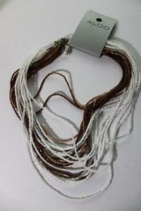 lot 113 image: (2) Signed Aldo glass micro bead necklaces. On hanging card. Each 16L with 2 extender.