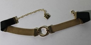 lot 119 image: Signed vintage Anne Klein gold plated metal mesh chokernecklace. Adjustable 12-15L. Has Anne Klein hang tag.