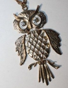 lot 143 image: Signed Ann Taylor articulated owl pendant necklace. Marked Ann Taylor on extender hang tag. 24L antiqued necklace with 2 extender. Owl 4L with crystal eyes.