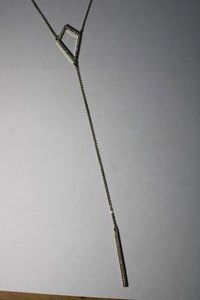 lot 164 image: Signed Express Y-style crystal necklace. Marked with Express hang tag. 16L. Overall length 34L. Lobster clasp.