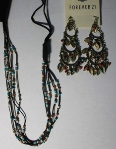 lot 174 image: Signed Forever 21 beaded necklace 24L and signed beaded chandelier ear wire 3L earrings. Both on retail cards.