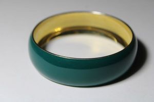 lot 190 image: Teal green enamel bangle bracelet. Marked J Crew inside.