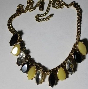 lot 197 image: Signed Kate Spade Gardens of Paris gold plated and marquise shaped prong set crystal necklace. Marked Kate Spade New York on hang tag. 16L. Originally retailed for $98