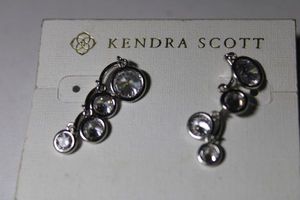 lot 199 image: Signed Kendra Scott poststud crystal earrings on card.