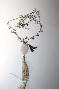 lot 212 image: Signed L & F (Lost & Found Co) metal and bead tassel necklace with stone pendant. 36L with L & F hang tag.