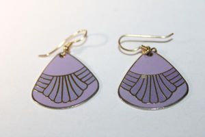 lot 213 image: Signed Laurel Burch vintage enamel waterfall fan shape ear wire earrings. Gold plated back and ear wires. Marked Laurel Burch on reverse. Circa 1980s.