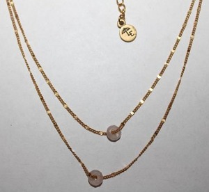 lot 214 image: Signed LE (Lauren Elizabeth) double chain necklace with Quartz or Tourmaline donut beads and LE hang tag. 14L with 2 extender