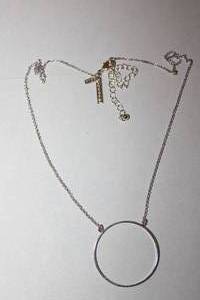 lot 216 image: Signed LeLe Sadoughi Circle Of Life pendant necklace. Has LeLe Sadoughi hang tag. Orig retail $95. 18L with a 4 extender
