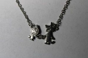 lot 237 image: Jewel Zone Alaskan style fairytale Little Red Riding Hood with big bad wolf character pendant necklace. 18L Spring ring clasp.