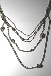 lot 243 image: Signed Anne Taylor Loft silver tone multi chain necklace with glass stations. 30L. Lobster clasp. Has Loft hang tag.